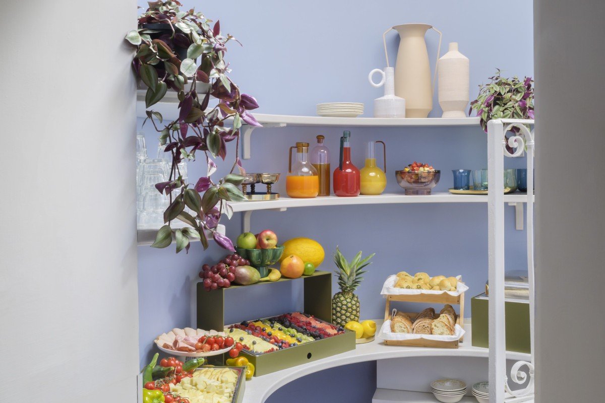 Breakfast buffet in Rome Monti area with fresh fruit, bread, pastries and drinks in a bright setting - Salotto Monti, BZAR hotels in Rome